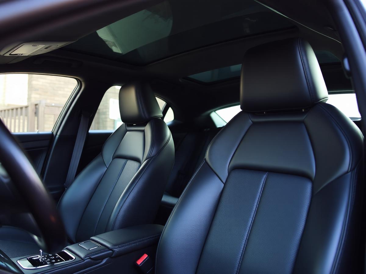 Spotless black leather car interior after a deep clean